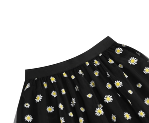 Detail of floral daisy print on black mesh high waist A-line skirt with elastic waistband