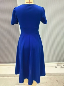 Detailed view of royal blue V-neck short sleeve midi dress with A-line waist design