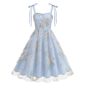 Light blue embroidered evening dress with ribbon straps and layered tulle skirt