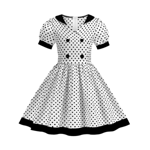 Girl's French style polka dot A-line dress with puff sleeves and double-breasted buttons