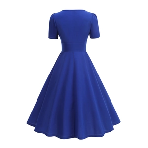Back view of a navy blue retro A-line dress with puff sleeves and cinched waist belt