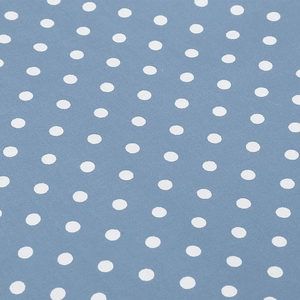 Gros plan sur la texture du tissu à pois rétro bleu clair et blanc pour robe vintage