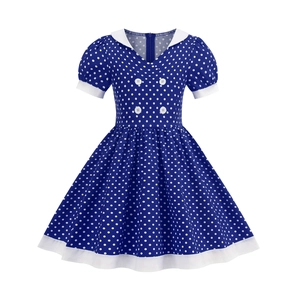 Navy blue polka dot girls' dress with white Peter Pan collar and puff sleeves