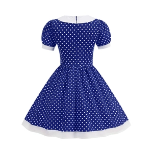 Detailed back view of a blue polka dot dress featuring a hidden zipper and A-line skirt