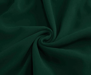 Macro shot showing detailed texture and drape of dark green chiffon crepe fabric