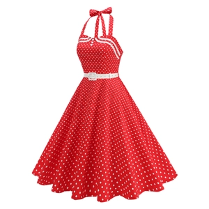Detail of red polka dot halter neck dress with white collar and button accents