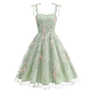 Mint green embroidered A-line dress with floral lace overlay and bow shoulder straps