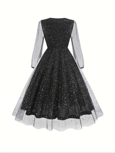 Detailed back view of V-neck dress with black starry mesh and shimmering glitter dots