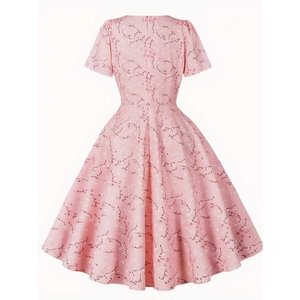 Pink floral A-line summer dress with short sleeves and retro back view on white background