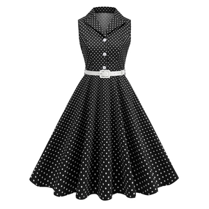 Robe rétro noire à pois sans manches style Hepburn avec ceinture blanche à la taille