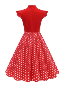 Detail of vintage red dress back with invisible zipper and white polka dot skirt