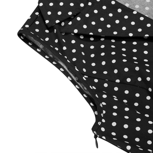 Détail du col d'une robe vintage à pois et fermeture éclair latérale invisible