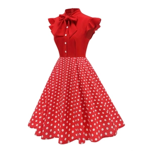 Vintage 1950s red and white polka dot dress with bow tie collar and swing skirt