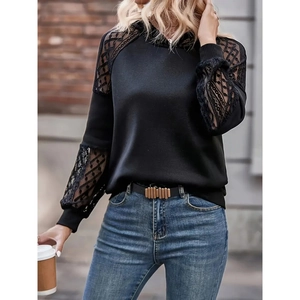 Chic black long sleeve hoodie featuring elegant lace splicing on shoulders and urban style