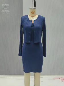 Detailed size chart for blue knit two-piece set showing cardigan and dress measurements