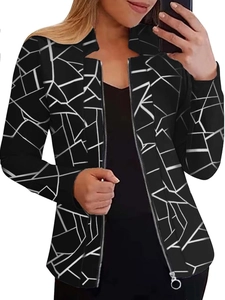 Detail of black jacket with white geometric patterns and silver round zipper pull
