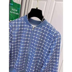 Women's blue and white plaid tweed jacket with metal zipper and baseball collar detail