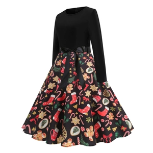 Detail of A-line Christmas dress showing festive gingerbread and candy cane print