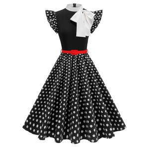 Vintage Audrey Hepburn style dress with polka dot skirt, bow collar and red waist belt