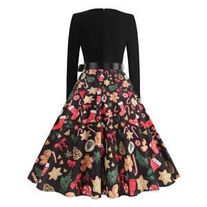 Rear view of long sleeve Christmas dress with festive print and black waist belt