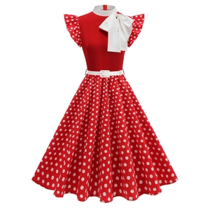 Vintage 1950s red floral polka dot dress with large white bow and swing skirt