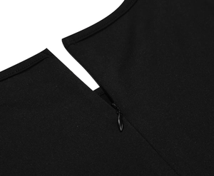Close-up of the concealed zipper closure on the back of this vintage Christmas dress