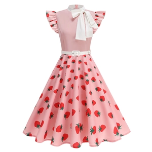 Vintage 1950s pink strawberry print dress with white bow collar and flared hem