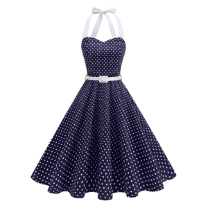 Retro halter polka dot dress in navy blue with white bow, sweetheart neckline and A-line skirt