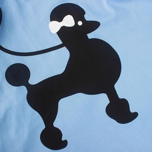 50s vintage light blue A-line dress featuring a black poodle print with white bow detail