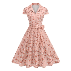Vintage A-line floral print dress in pink with button-down collar and waist belt