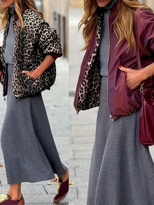 Dual-sided reversible bomber jacket featuring leopard print and burgundy satin finish