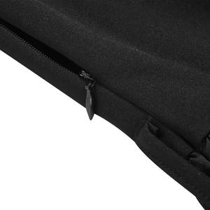 Detailed close-up showing the invisible zipper and woven texture of the black dress