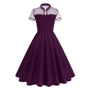 Detail of sheer mesh polka dot short sleeves and back tie on dark purple dress