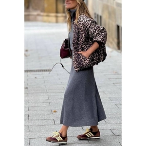 Women's leopard print reversible puffer jacket with grey knit maxi dress street style