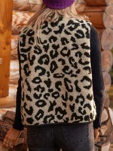 Outdoor shot of stylish leopard print fleece vest with black trim shown from the back