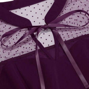 Detail of plum vintage dress neck with mesh polka dots and satin ribbon bow tie