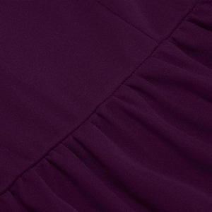 Detailed macro view of dark purple pleated chiffon fabric with precise stitching details