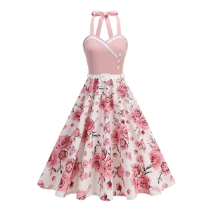 Vintage 1950s Audrey Hepburn halter dress in pink with floral rose print swing skirt