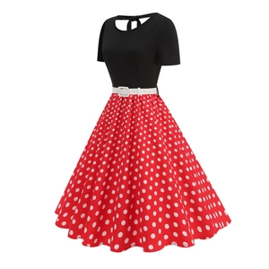 Retro polka dot flare dress featuring black short sleeves and a red bow detailed skirt