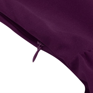 Close-up of a concealed back zipper on the dark purple mesh polka dot retro dress