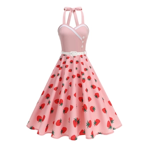 Vintage 1950s halter neck dress with pink strawberry print and a white belt