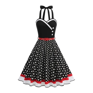 Retro 1950s polka dot halter dress with red waist belt and flared hemline