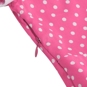 Detail of invisible side zipper and white polka dots on pink vintage girls dress