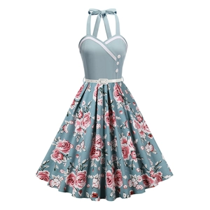 Retro 1950s halter dress with blue bodice and floral print flared skirt for women
