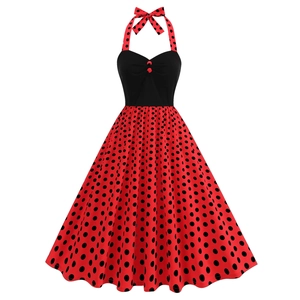 Retro 1950s halter dress with black bodice and red polka dot flared skirt style