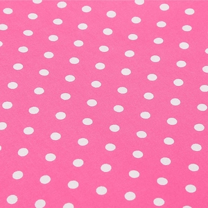 Makroaufnahme von rosa Stoff mit weißen Punkten für klassische Kleider im Retro-Stil