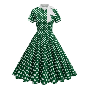 Vintage green polka dot Hepburn dress with white collar and bowknot detail