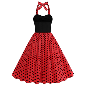 Detail view of red polka dot vintage halter dress with black contrast bodice and A-line hem