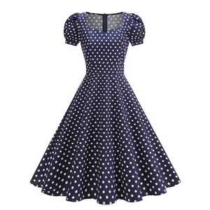 Retro navy blue polka dot A-line dress with puff sleeves and Audrey Hepburn style square neck