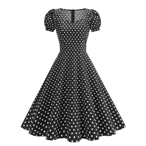 Retro Audrey Hepburn style polka dot A-line dress with puff sleeves and sweetheart neckline